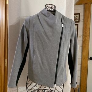 Asymmetrical zippered long sleeved jacket